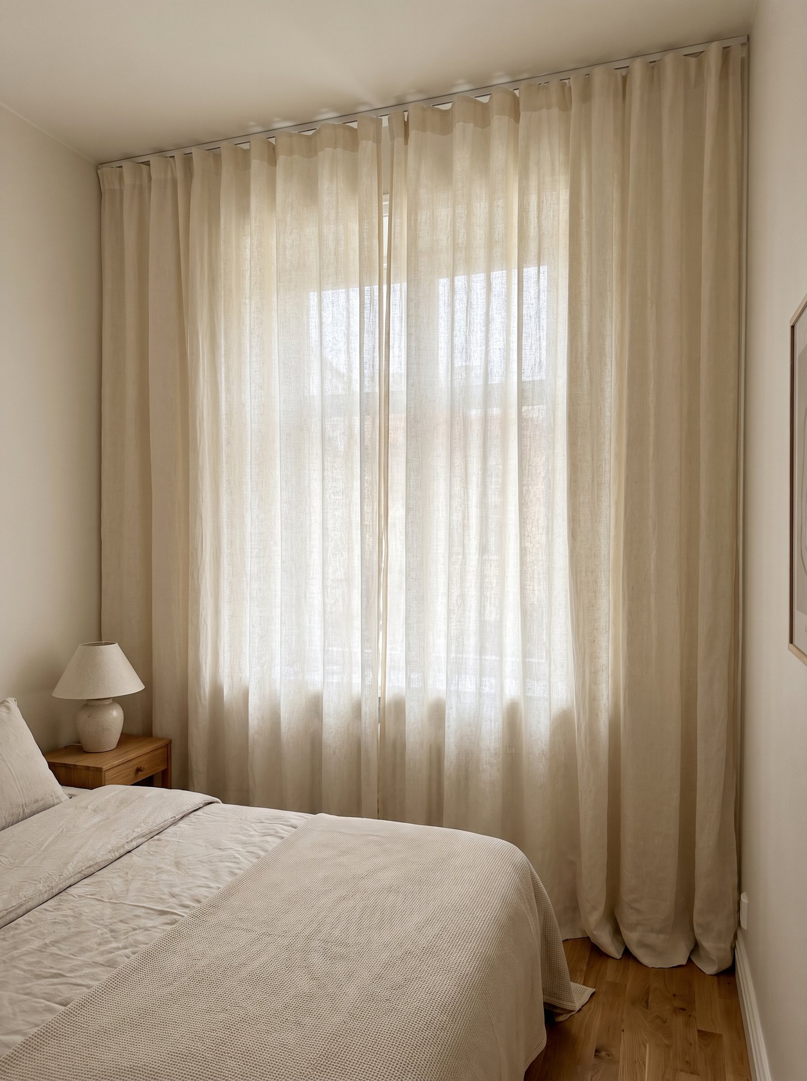 Hang curtains from ceiling to floor
