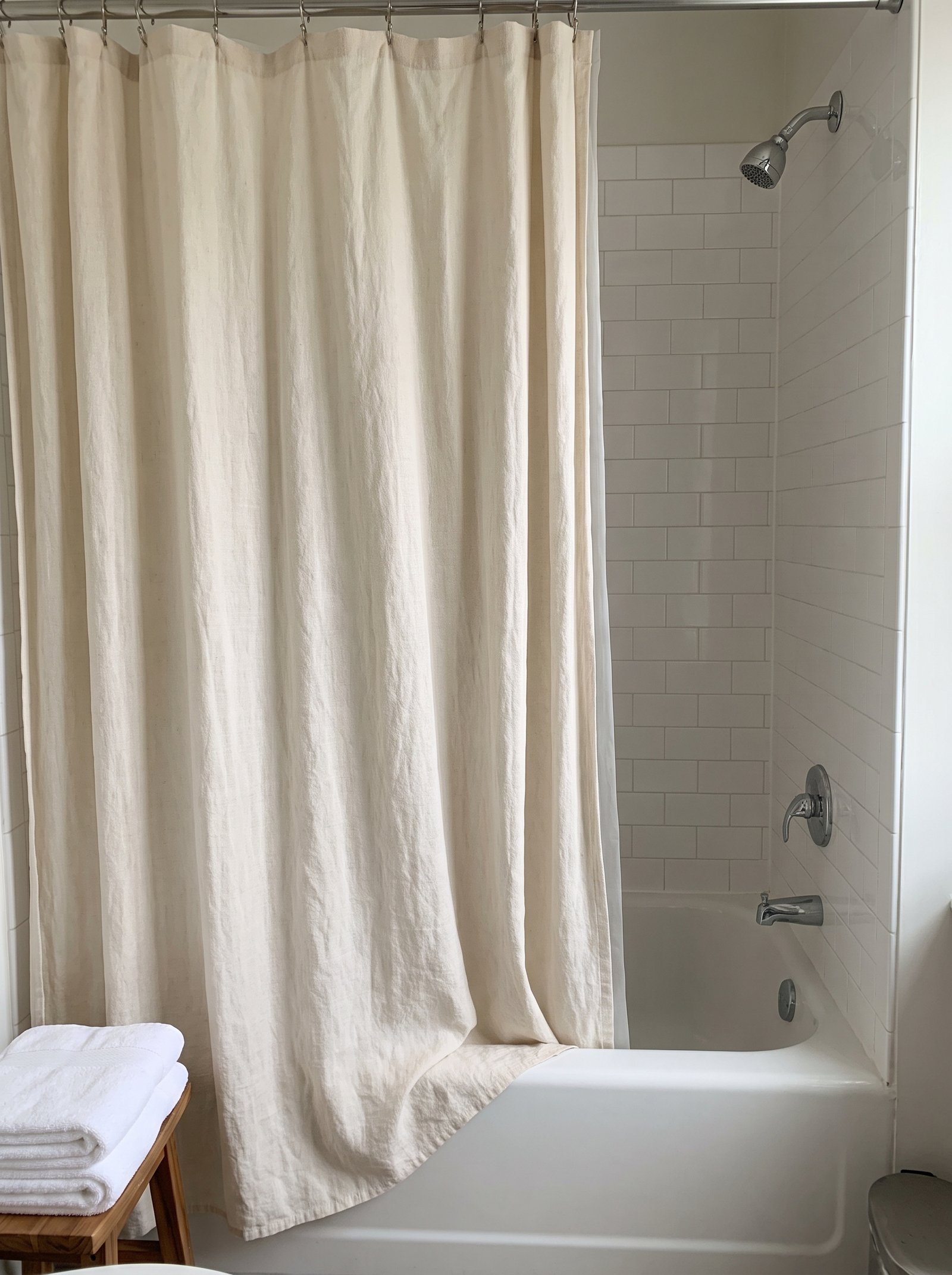 Swap the plastic shower curtain for linen